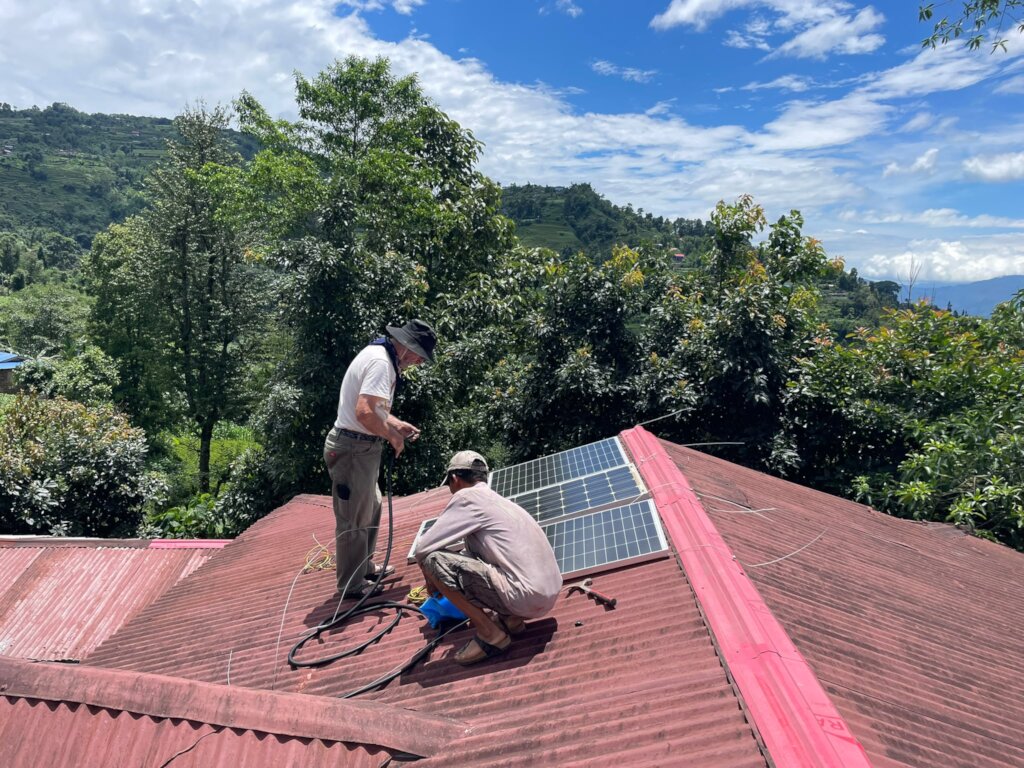 Installing panels on the roof (of the world!)