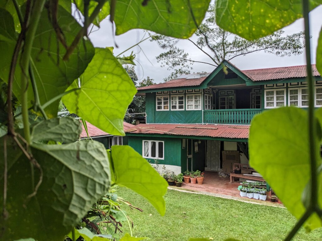Main house with solar panels top left