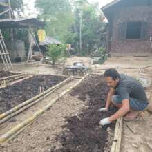 Compost layer being added to a new bed