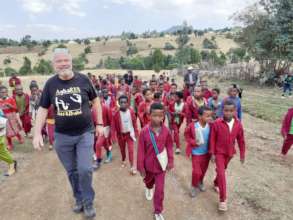 Dr T and the school pupils near Ambo