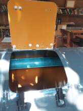 Door open, showing scoop inside