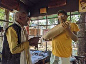 Neighbor presents Praveen with a giant marrow