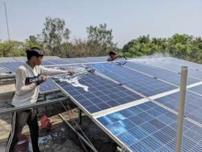 My solar students wash off much accumulated dust