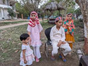 Local kids often visit Praveen's farm