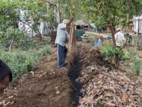 "Charging" or "inoculating" the biochar in compost