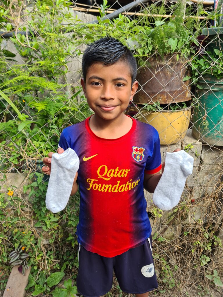 Brayan, another child who will receive a beca.