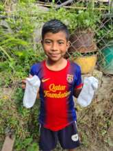 Brayan, another child who will receive a beca.