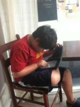 Micah loves to draw on his iPad!