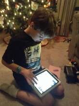 Max loves his iPad!!
