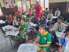 Students giving attention to teacher