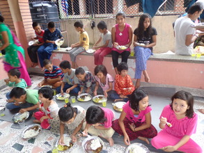 Kids enjoying feast organised by CDC Nepal