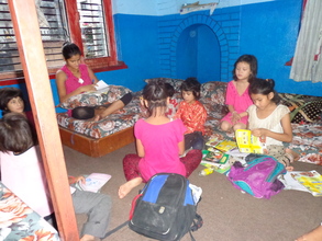 Kids reading in the room