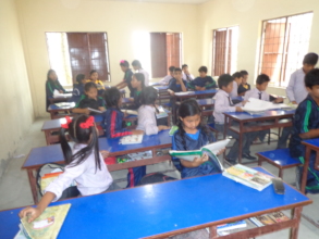The kids studying in the classroom