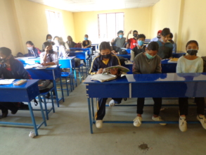 Students reading at class