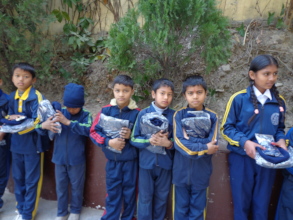 Students receiving new uniforms