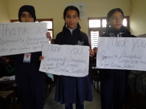 Students thanking us with playcard