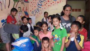 Mihika with  the kids of the orphanage