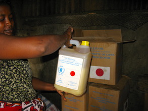 Head Cook showing us cooking oil