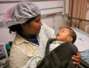 looking at where his cleft lip USED to be!