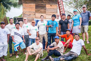 Telecom team with community members