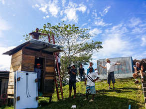 Noah Haas installing solar panels