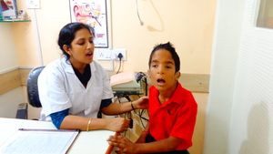 Sudhir getting speech therapy with hearing aids