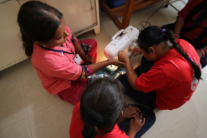 Learning to use sewing machine