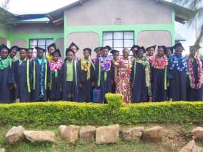 pupils having fun with teachers during graduation