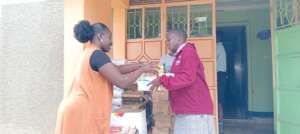 Students receiving their back to school hampers