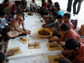 SIS students busy  in Pot painting and Terracotta