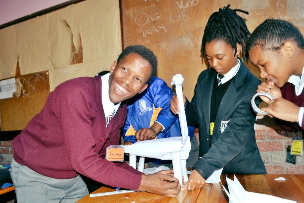 Learners assembling a project during Winter School