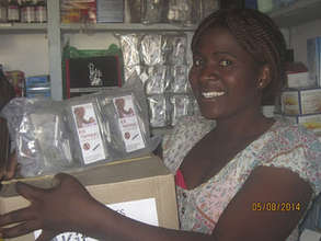 Shopkeeper Christine with new stock