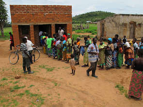 Kit Yamoyo is here! Queue at Chison Banda's shop