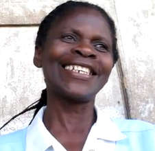 Healthworker Gladys Imasiku talks to Simon Berry