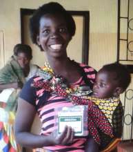 Woman & child with our ORSZ pack-Chinsali district