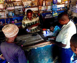 Mr Phiri demonstrates Kit Yamoyo to new customers