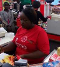 Trained supermarket cashiers promote Kit Yamoyo