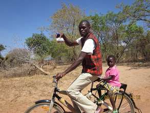 A happy customer on his way home with his AidPod