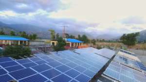 Power lines run above the solar array again!