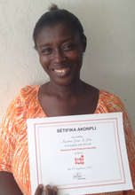Jonas shows off her training certificate