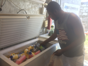 Vladimir with his freezer at the solar site