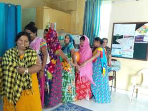 Women take place in community-building activities
