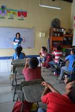 Volunteer teaching English class