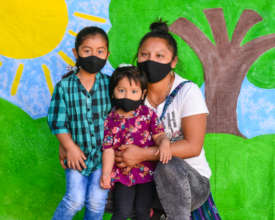 Our new student Genesis with her mom and sister.