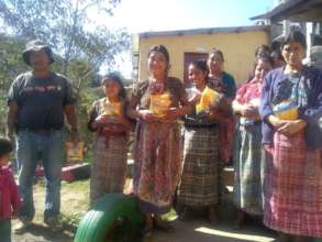 Parents thanking the donation of "CHISPUDITOS"