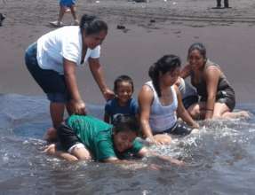 Mothers and kids at the beach