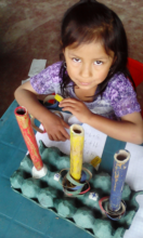 Repurposing paper towel rolls to teach addition