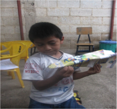 El Rosario boy with airplane October 2014