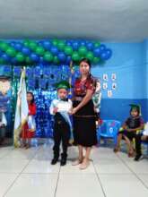 We see Delsy with one of her best students