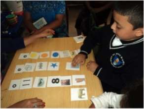 Boy using literacy materials